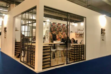 Branded trade show display with integrated screens